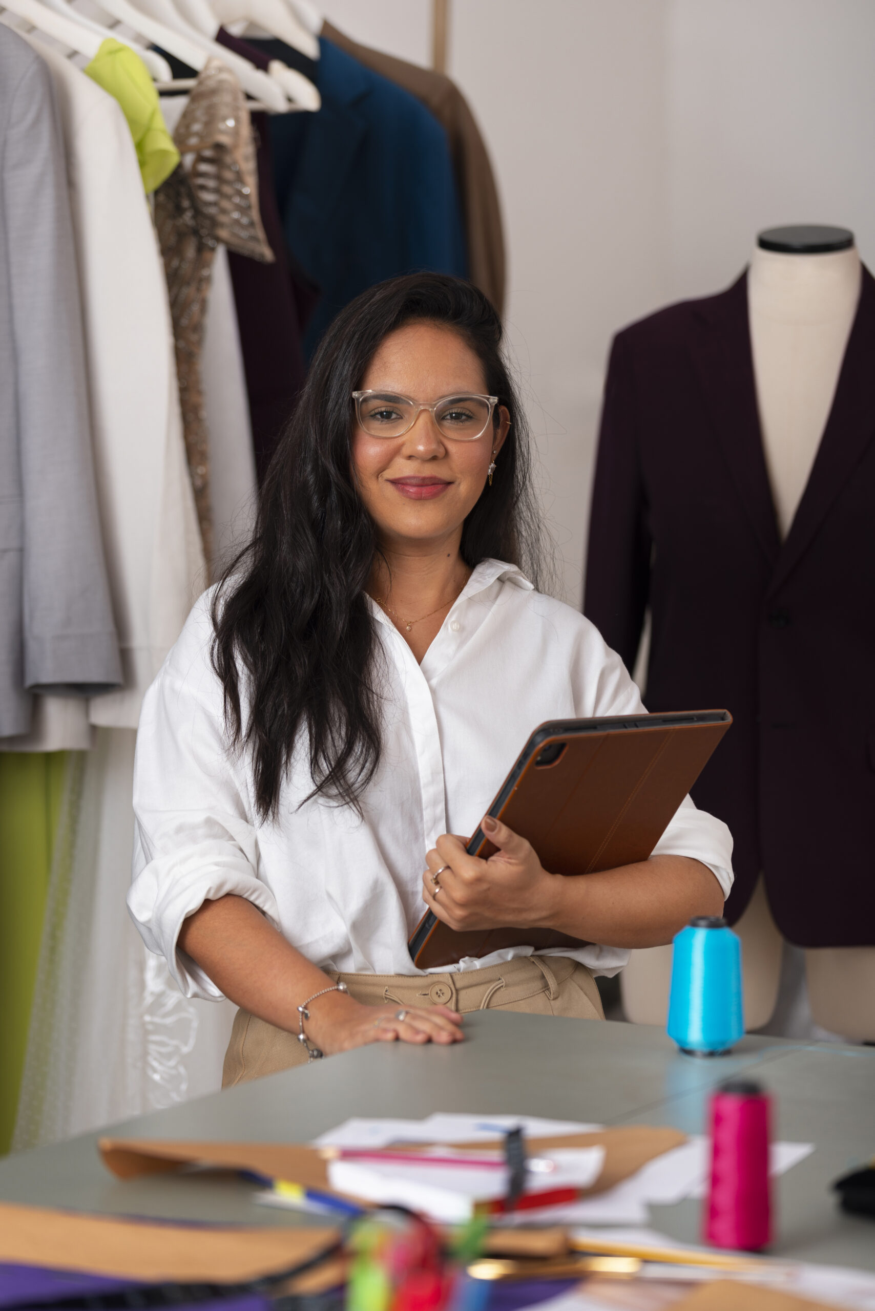 front-view-brazilian-woman-working-as-clothing-designer